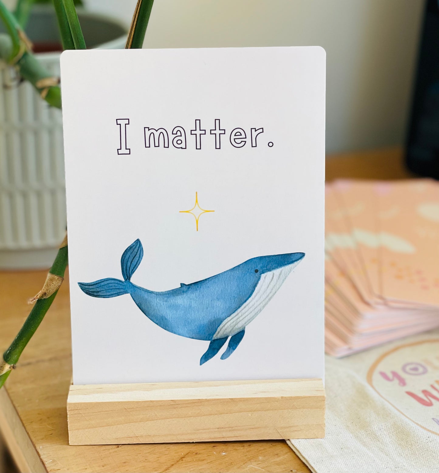 affirmation card on wooden holder