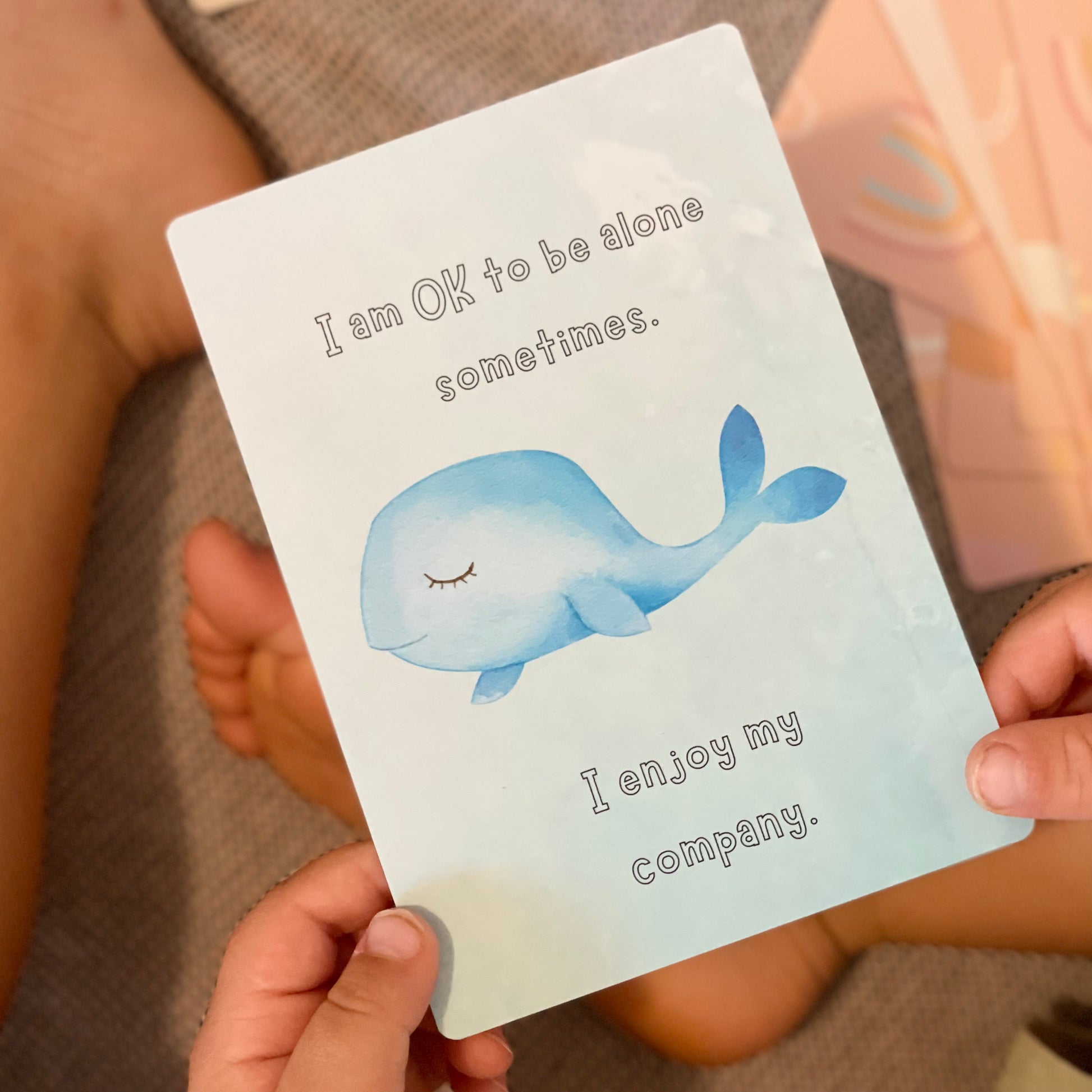 affirmation card help by child with ocean whale theme